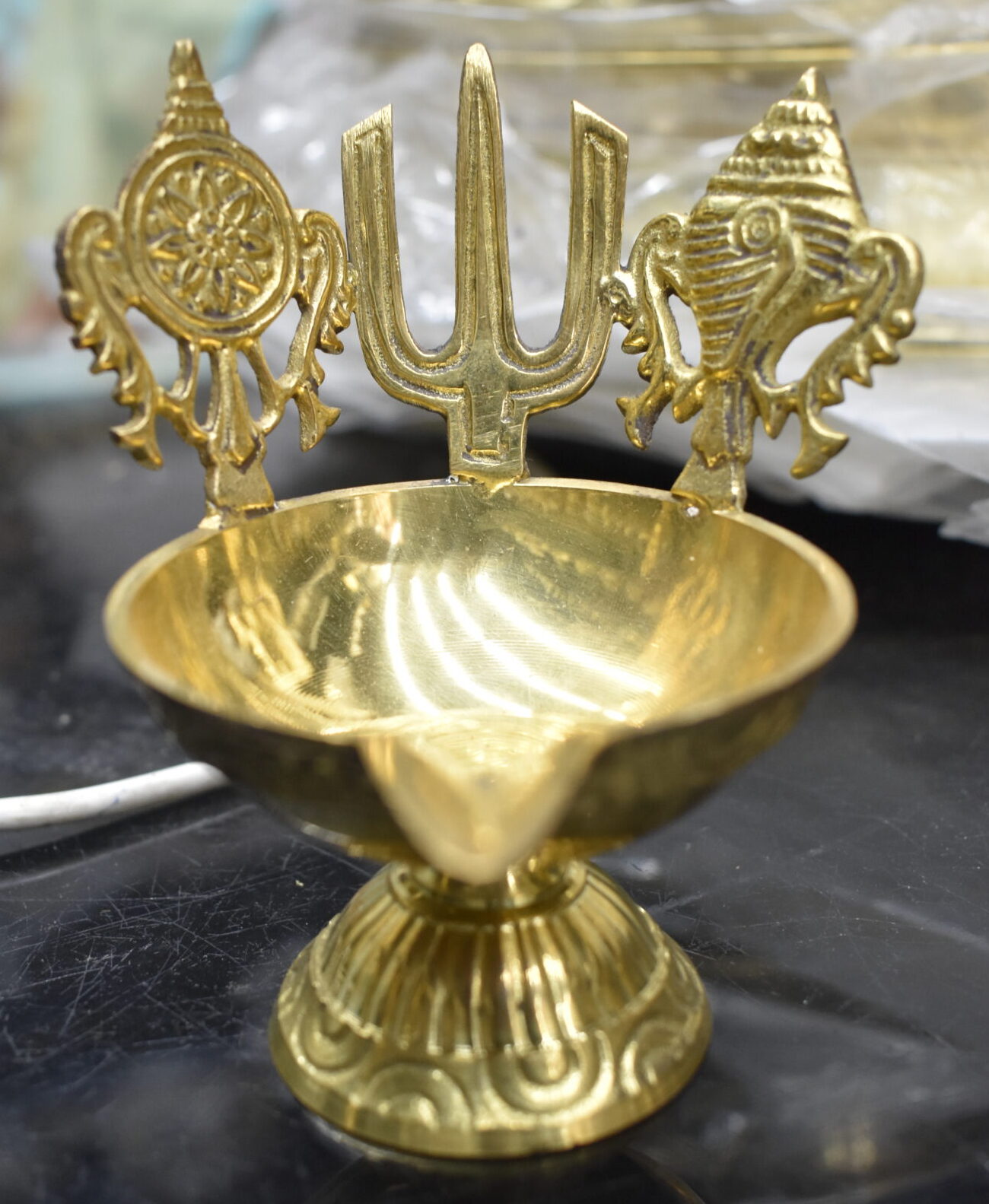Brass Pooja Diya with Trishul, Chakra & Shankh Design in tirupati
